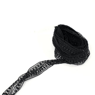 black lace ribbon trim on a white background