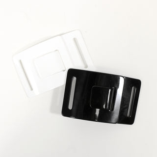 large white and large black plastic buckles for novelty use in sewing