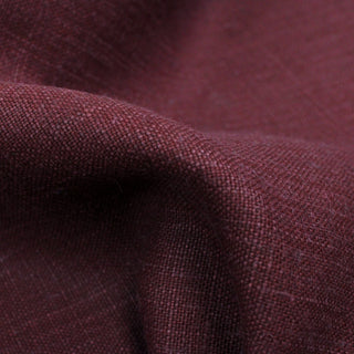 close-up of a burgundy colored linen upholstery fabric