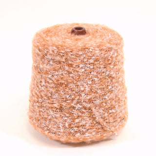 Loop yarn in cinnamon orange on  white background.