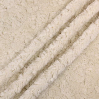 Three lines draped of a cream long pile faux fur fabric.