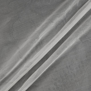 three diagonal lines draped of an ivory silk organza fabric with a very subtle large scale woven-in floral motif