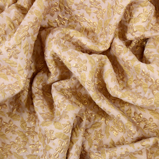 Close up of a floral jacquard fabric detailing the drape.