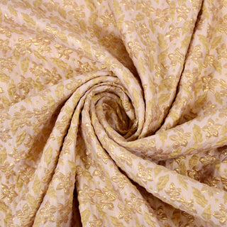 Swirl of a floral jacquard fabric detailing the drape and surface shine.