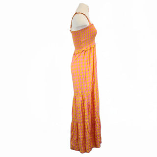 side of pink and orange gingham long dress with straps and bodice shirring