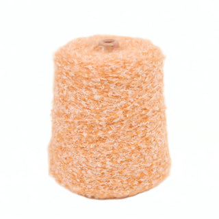 Grapefruit pink loop yarn on a white background.