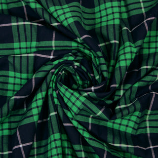 Swirl of a green plaid fabric, detailing the drape and surface shine.