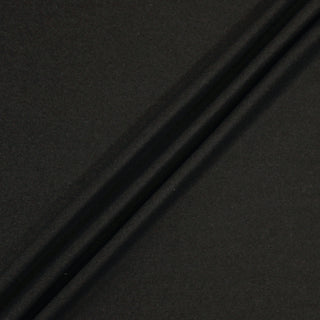 Three lines draped of a grey heathered wool suiting.