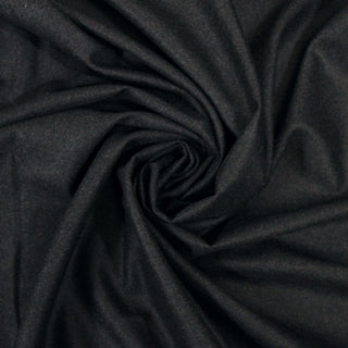 Swirl of a grey heathered wool suiting, detailing the surface shine and drape.