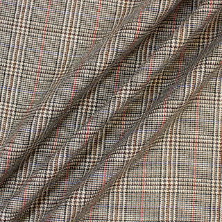 Three lines draped of a houndstooth plaid suiting.