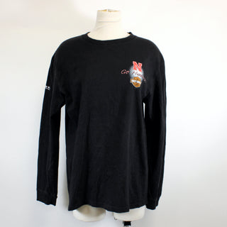 Black long-sleeve shirt with a logo on a mannequin against a white background