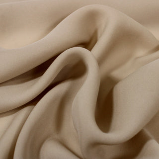 close-up of a rumpled, latte tan colored, silk chiffon fabric