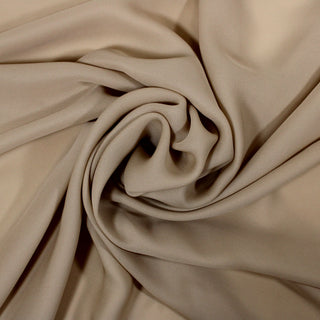 swirl of a latte brown colored silk chiffon fabric