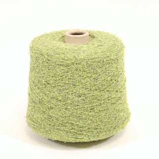 Cone of green loop yarn on a white background.