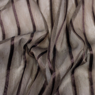 Close up of a mesh striped brown fabric, detailing the surface shine