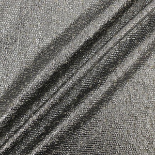 three diagonal lines draped of a metallic-coated tweed fabric