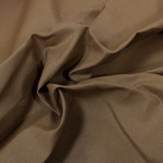 Closeup of a milk chocolate canvas, detailing the surface shine.