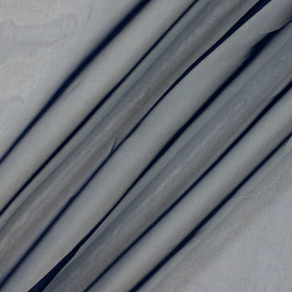 three diagonal lines draped of a navy blue silk organza fabric