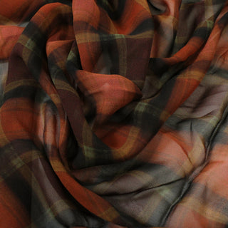 Close-up of plaid fabric with warm colors