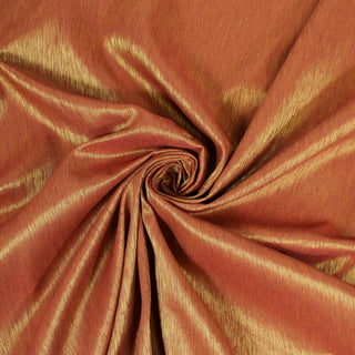 Swirl of an orange and gold faille, detailing the surface shine and drape.