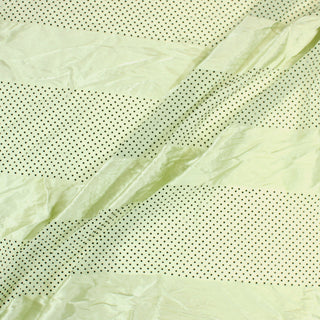 Three lines draped of a pistachio green satin fabric