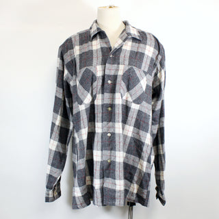 front view of a vintage brushed flannel plaid button up shirt