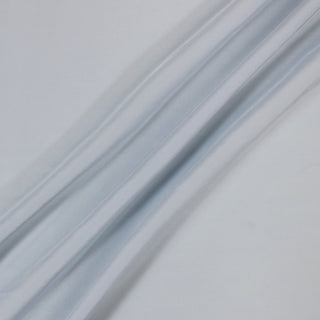 three lines draped of a powder b=blue rayon crepe fabric