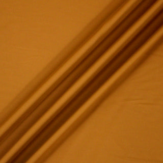 Three lines draped of an orange jersey fabric.