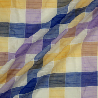Three lines draped of a seersucker plaid fabric.