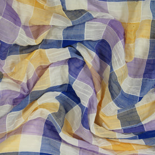 Close up of a seersucker plaid fabric, detailing the drape
