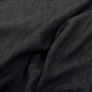 close-up of a slate blue waffle knit fabric