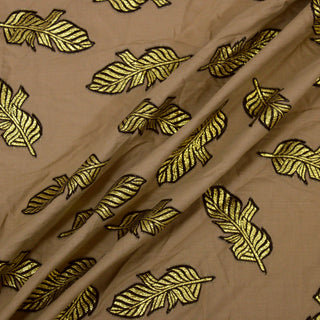Three lines draped of a brown plain weave fabric with brocade feather embroidery.